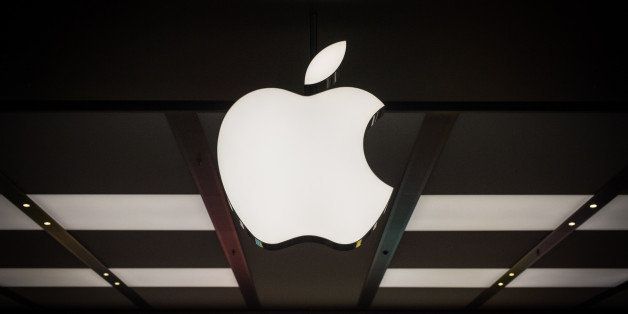 View of the famous logo at new Apple store in Barra da Tijuca, Rio de Janeiro, Brazil, on Februrary 16, 2014. Some 1,700 impatient shoppers lined up for hours on the eve for the grand opening of Apple's store in Rio de Janeiro -- the first official outpost in South America. AFP PHOTO / YASUYOSHI CHIBA (Photo credit should read YASUYOSHI CHIBA/AFP/Getty Images)