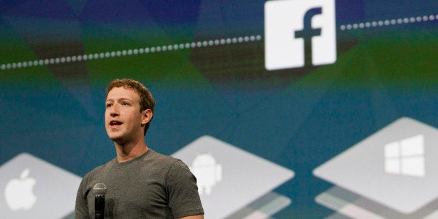 Mark Zuckerberg, chief executive officer of Facebook Inc., speaks during the Facebook F8 Developers Conference in San Francisco, California, U.S., on Wednesday, April 30, 2014. Facebook will offer software developers improved tools to create programs that run on any smartphone and a more streamlined experience for people to log into apps, including the option to sign in anonymously. Photographer: Erin Lubin/Bloomberg via Getty Images 