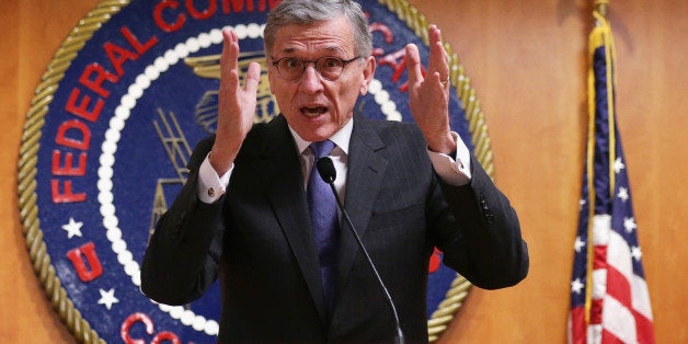 WASHINGTON, DC - MAY 15: Federal Communications Commission (FCC) Chairman Tom Wheeler speaks during a news conference after an open meeting to receive public comment on proposed open Internet notice of proposed rulemaking and spectrum auctions May 15, 2014 at the FCC headquarters in Washington, DC. The FCC has voted in favor of a proposal to reform net neutrality and could allow Internet service providers to charge for faster and higher-quality service. (Photo by Alex Wong/Getty Images)