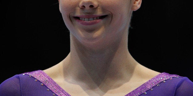 ANTWERPEN, BELGIUM - OCTOBER 05: McKayla Maroney of USA poses after winning the Gold medal in the Vault Final on Day Six of the Artistic Gymnastics World Championships Belgium 2013 held at the Antwerp Sports Palace on October 5, 2013 in Antwerpen, Belgium. (Photo by Dean Mouhtaropoulos/Getty Images)