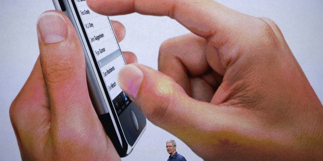 CUPERTINO, CA - SEPTEMBER 09: Apple CEO Tim Cook speaks during an Apple special event at the Flint Center for the Performing Arts on September 9, 2014 in Cupertino, California. Apple unveiled the Apple Watch wearable tech and two new iPhones, the iPhone 6 and iPhone 6 Plus. (Photo by Justin Sullivan/Getty Images)