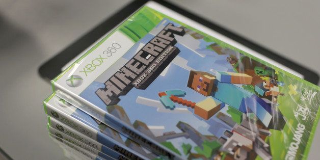 MIAMI, UNITED STATES - SEPTEMBER 15: An XBox 360 Minecraft game is seen at a GameStop store on Septemeber 15, 2014 in Miami, Florida. Microsoft today announced it will acquire video game maker Mojang and its popular Minecraft game for $2.5 billion. (Photo by Joe Raedle/Getty Images)
