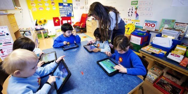 Nursery school pupils work with iPads on March 3, 2014 in Stockholm. AFP PHOTO/JONATHAN NACKSTRAND (Photo credit should read JONATHAN NACKSTRAND/AFP/Getty Images)