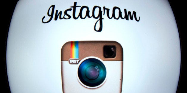 The Instagram logo is displayed on a tablet on December 20, 2012 in Paris. Instagram backed down on December 18, 2012 from a