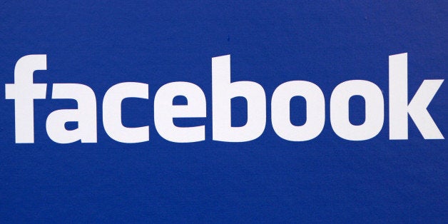 ** FILE ** The Facebook logo is displayed at a news conference in New York in this November 6, 2007 file photo. A new application is aiming to inject more commerce into the social playground by paying Facebook members who help make sales to their friends. (AP Photo/Craig Ruttle, file)