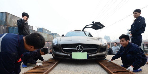 BEIJING, CHINA - OCTOBER 08: (CHINA OUT) First patch of self-driving travel autos carried by a special train arrives in Beijing on October 8, 2014 in Beijing, China. A train carrying 50 self-driving travel autos arrives in beijing from Hangzhou, which brings convenicence for people who choose self-driving travel. (Photo by ChinaFotoPress/ChinaFotoPress via Getty Images)