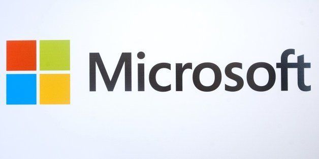 The Microsoft logo is seen before the start of a media event in San Francisco, California on Thursday, March 27, 2014. Satya Nadella, CEO of Microsoft, unveiled a version of Office designed for the iPad today. Microsoft is tapping into its software past as it maps its future in the rapidly changing world of Internet technology. AFP PHOTO/JOSH EDELSON (Photo credit should read Josh Edelson/AFP/Getty Images)