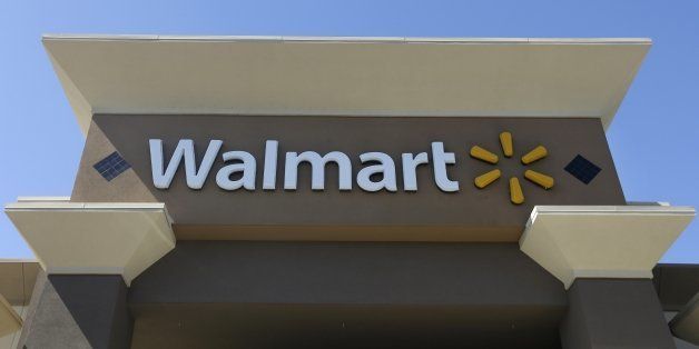 This Sept. 19, 2013 photo shows the sign of a Walmart store in San Jose, Calif. (AP Photo/Jeff Chiu)