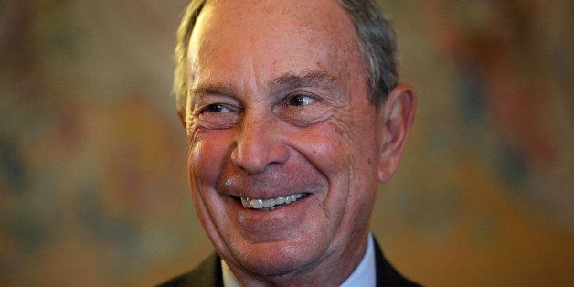 FILE - In this Tuesday, Sept. 16, 2014 file photo, former New York Mayor Michael Bloomberg smiles prior to be conferred with the Chevalier de la Legion d'Honneur by France's Foreign minister Laurent Fabius, at the Quai d'Orsay, in Paris. Michael Bloomberg is a knight _ but he wonât be Sir Mike. Britain's Queen Elizabeth II has bestowed an honorary knighthood on the billionaire businessman and former New York mayor. The British government said Monday, Oct. 6, 2014, that Bloomberg was made "an Honorary Knight of the Most Excellent Order of the British Empire" in recognition of his "prodigious entrepreneurial and philanthropic endeavors" and his work to strengthen trans-Atlantic ties. (AP Photo/Thibault Camus, File)