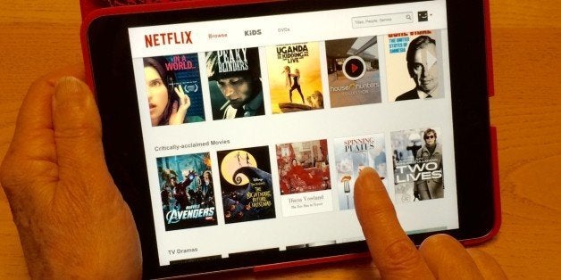 Picking a movie on Netflix on the iPad mini 