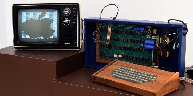 A press preview at Christies on December 5, 2014 displays The Ricketts Apple-1 Personal Computer, as part of the auction hous