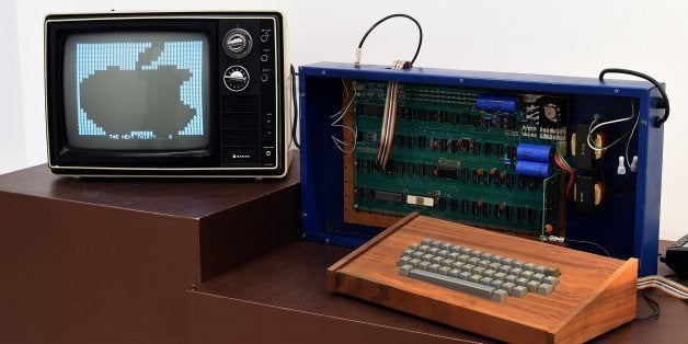 A press preview at Christies on December 5, 2014 displays The Ricketts Apple-1 Personal Computer, as part of the auction houses inaugural Exceptional Sale in New York, taking place on December 11 at Rockefeller Center. Named after its first owner Charles Ricketts, this example is the only known surviving Apple-1 documented to have been sold directly by Steve Jobs to an individual from his parents garage. It is estimated at $400,000 600,000, the highest estimate yet for an original Apple-1 offered at auction. AFP PHOTO / Timothy A CLARY (Photo credit should read TIMOTHY A. CLARY/AFP/Getty Images)