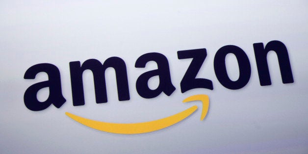 The logo for Amazon.com is displayed at a news conference, Wednesday, Sept. 28, 2011 in New York. (AP Photo/Mark Lennihan)