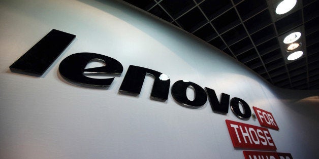 The Lenovo Group Ltd. logo is displayed in the company's headquarters in Beijing, China, on Tuesday, Nov. 11, 2014. Lenovo Ch