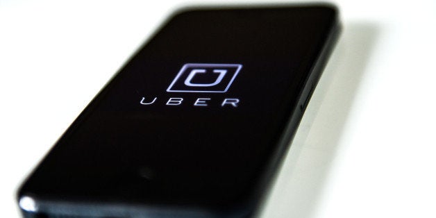 BARCELONA, SPAIN - JULY 01: In this photo illustration, the app 'Uber' is launched in a smart phone on July 1, 2014 in Barce