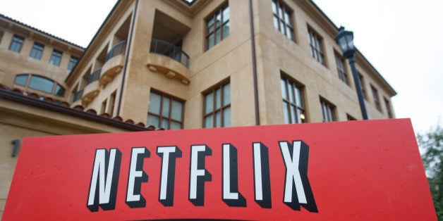 FILE - This Jan. 29, 2010 file photo, shows the company logo and view of Netflix headquarters in Los Gatos, Calif. Netflix Inc. has reached a multiyear agreement Tuesday, Aug. 10, 2010, to stream movies from Paramount, Lionsgate and MGM online starting Sept. 1. It's a major move as Netflix looks to cater to people who want to watch movies instantly. (AP Photo/Marcio Jose Sanchez, file)