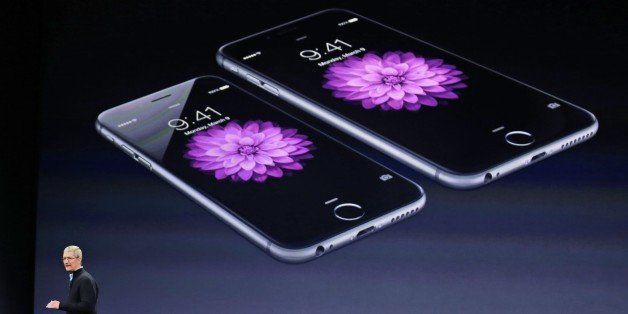 Apple CEO Tim Cook talks about the iPhone 6 and iPhone 6 Plus during an Apple event on Monday, March 9, 2015, in San Francisco. (AP Photo/Eric Risberg)
