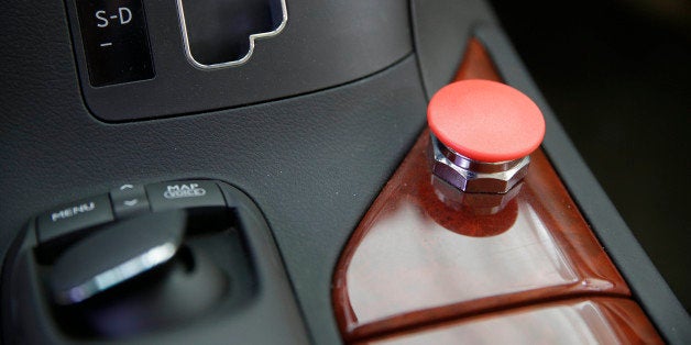 In this photo taken Wednesday, May 14, 2014, a kill switch is shown inside a Google self-driving car on exhibit at the Computer History Museum in Mountain View, Calif. Four years ago, the Google team developing cars which can drive themselves became convinced that, sooner than later, the technology would be ready for the masses. There was just one problem: Driverless cars almost certainly were illegal.(AP Photo/Eric Risberg)