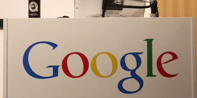 BERLIN, GERMANY - AUGUST 21: The Google logo is seen on a podium holding a bottle of beer in the company's offices on August