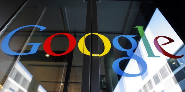**FOR USE WITH AP LIFESTYLES** ** FILE ** This Thursday, March 6, 2008 file photo shows the logo of Google on the front door of the new Google European tech center in Zurich, Switzerland. The Internet giant worked with a psychologist and design team to interview all 350 employees and incorporated their ideas into a new workspace _ yet insisted the new design should not cost more than an ordinary office building. (AP Photo/Keystone, Walter Bier, file)