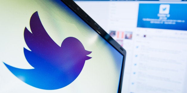 (FILES) File photo dated September 11, 2013 shows the logo of the social networking website 'Twitter' displayed on a computer