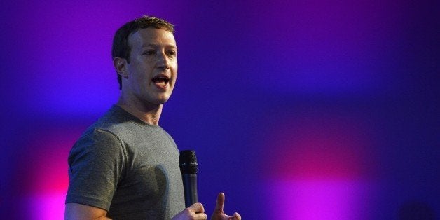 US chairman and chief executive of Facebook Mark Zuckerberg gestures as he announces the Internet.org Innovation Challenge in