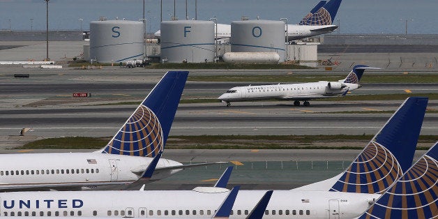 SAN FRANCISCO, CA - MARCH 13: A United Airlines plane taxis on the runway at San Francisco International Airport on March 13, 2015 in San Francisco, California. According to a passenger survery conducted by SkyTrax, San Francisco International Airport (SFO) was been named the best airport in North America for customer service. SkyTrax collected over 13 million questionnaires at 550 airports around the world. (Photo by Justin Sullivan/Getty Images)