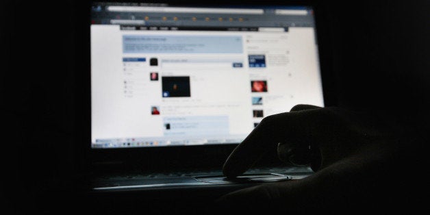 LONDON, ENGLAND - MARCH 25: In this photo illustration the Social networking site Facebook is displayed on a laptop screen o