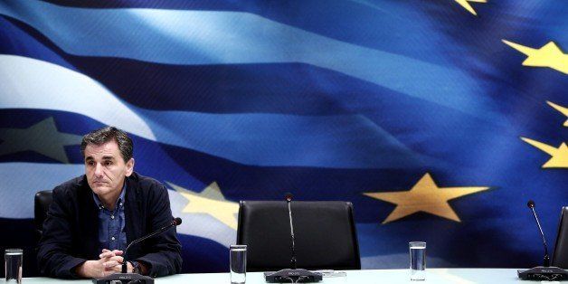 Newly appointed Greek Finance Minister Euclid Tsakalotos looks on during a handover ceremony at the Finance Ministry in Athens on July 6, 2015. Greeks declared in a referendum that they 'deserve better' and 'cannot accept a non-viable solution' to the country's debt crisis, new Finance Minister Euclid Tsakalotos said upon taking office. A 55-year-old leftist economist who had been a pointman in Greece's bailout talks since April, Tsakalotos replaced the flamboyant Yanis Varoufakis hours after the latter resigned on Monday, ostensibly to facilitate the negotiations.AFP PHOTO / ANGELOS TZORTZINIS (Photo credit should read ANGELOS TZORTZINIS/AFP/Getty Images)
