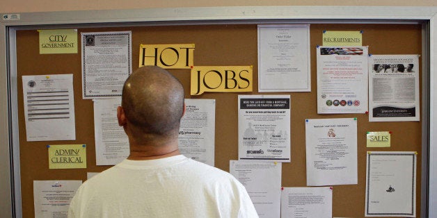 A job seeker checks for new jobs postings at the Glendale Workforce Services Center Thursday, Aug. 19, 2010, in Glendale, Cal