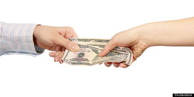 hand giving money isolated on...