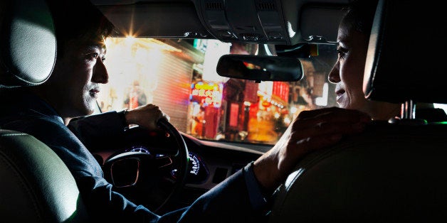 Man and Woman in Car, Rear View