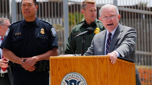 U.S. Attorney General Jeff Sessions speaks during a visit to the U.S. Mexico border wall for a press conference with Immigration and Customs Enforcement Deputy Director Thomas D. Homan, discussing immigration enforcement actions of the Trump Administration near San Diego, California, U.S. May 7, 2018. REUTERS/Mike Blake