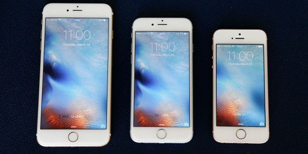 FILE - In this Thursday, March 24, 2016, file photo, from left, the iPhone 6S Plus, 6S and SE lie next to each other in a comparison photograph, in New York. Apple has turned 40, and itâs a very different company from the audacious startup that Steve Jobs and Steve Wozniak launched in a Silicon Valley garage in 1976. (AP Photo/Julie Jacobson, File)