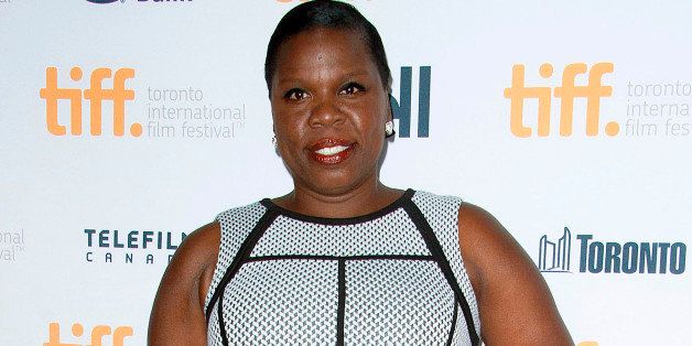 FILE - In this Sept. 6, 2014, file photo, actress Leslie Jones poses at the "Top Five" premiere at the Princess of Wales Theatre during the Toronto International Film Festival in Toronto. Jones, of the upcoming all-female version of "Ghostbusters," took to Twitter to defend her role as a member of the paranormal-fighting group who appears in footage released this week to be an employee of the Metropolitan Transportation Authority. (Photo by Arthur Mola/Invision/AP, File)