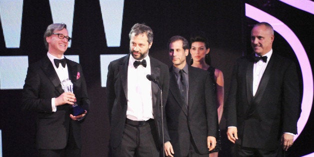 LOS ANGELES, CA - JANUARY 12: Director Paul Feig, producer Judd Apatow, Barry Mendel, and Clayton Townsend speak onstage at the 17th Annual Critics' Choice Movie Awards held at The Hollywood Palladium on January 12, 2012 in Los Angeles, California. (Photo by Jeff Kravitz/FilmMagic)