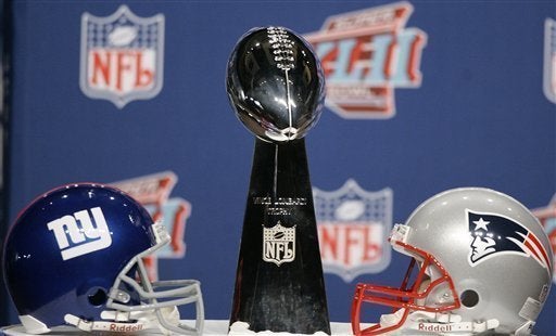 Super Bowl XLII: Giants shock Patriots in Super Bowl win