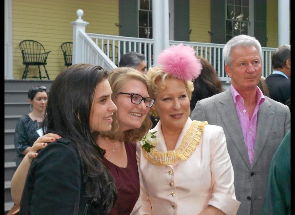 Bette Midler posing for pics with fans