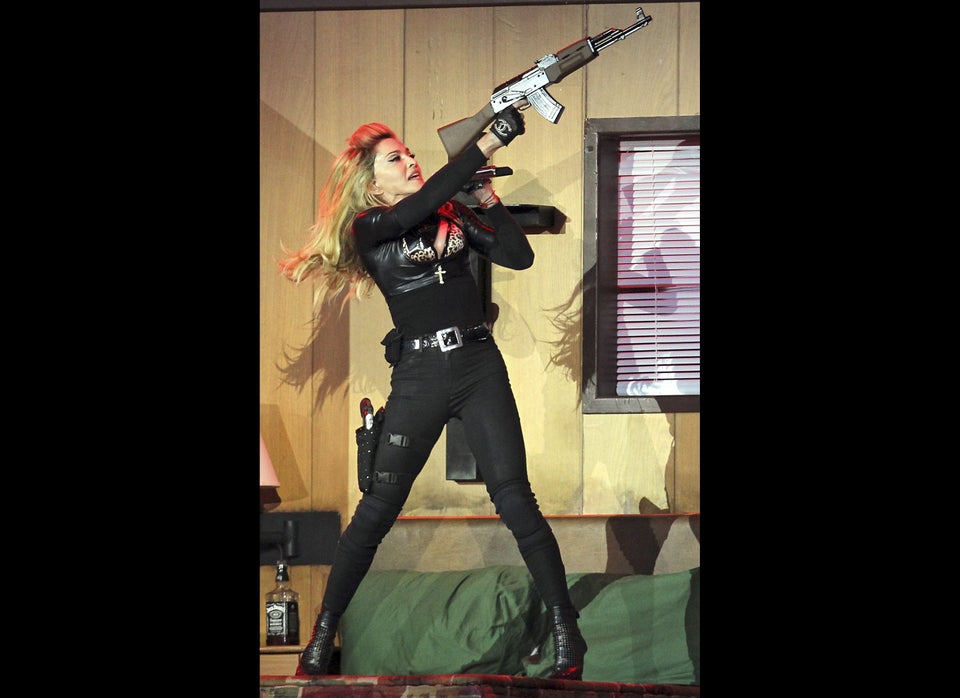 Madonna & Guns: Singer Brandishes Fake Pistols & Machine Guns Despite ...