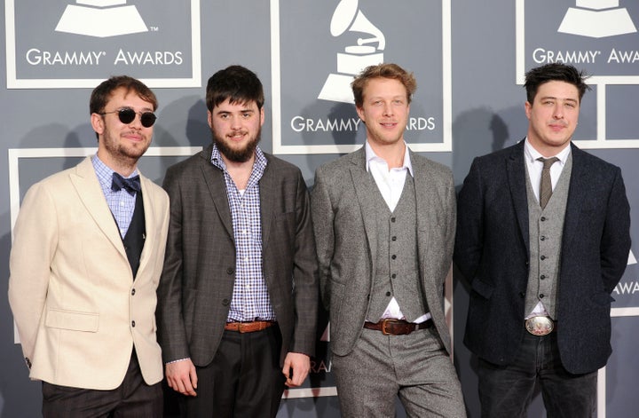 LOS ANGELES, CA - FEBRUARY 12: (L-R) Ben Lovett, Winston Marshall, Ted Dwane, and Marcus Mumford of Mumford & Sons arrive at