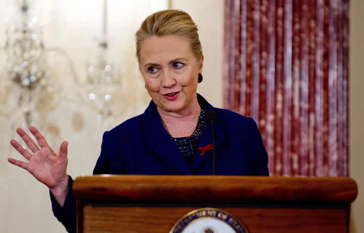 US Secretary of State Hillary Clinton speaks during an event in recognition of World AIDS Day at the State Department in Washington, DC, November 29, 2012. AFP Photo/Jim WATSON (Photo credit should read JIM WATSON/AFP/Getty Images)