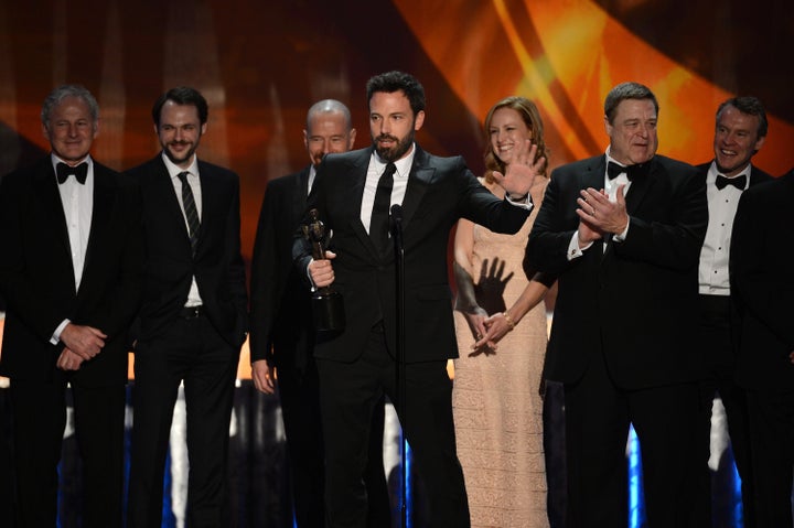 LOS ANGELES, CA - JANUARY 27: (L-R) Actors Victor Garber; Christopher Denham; Bryan Cranston; Ben Affleck (speaking); Kerry Bishe; John Goodman; and Tate Donovan accept the award for Outstanding Performance by a Cast in a Motion Picture for 'Argo' onstage during the 19th Annual Screen Actors Guild Awards held at The Shrine Auditorium on January 27, 2013 in Los Angeles, California. (Photo by Mark Davis/Getty Images)