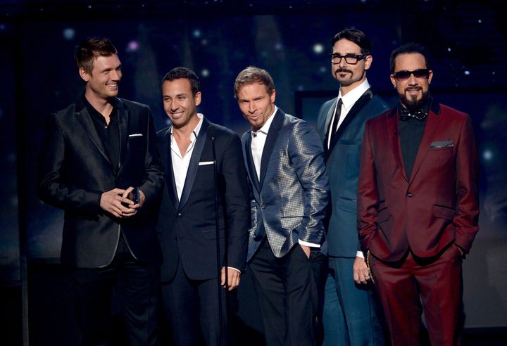 LOS ANGELES, CA - NOVEMBER 18: (L-R) Presenters Nick Carter, Howie Dorough, Brian Littrell, Kevin Richardson and AJ McLean of Backstreet Boys speak onstage during the 40th American Music Awards held at Nokia Theatre L.A. Live on November 18, 2012 in Los Angeles, California. (Photo by Kevin Winter/Getty Images)