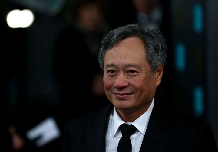 Taiwanese born US director Ang Lee poses for photographs on the red carpet as he arrives for the BAFTA British Academy Film Awards at the Royal Opera House in London on February 10, 2013. AFP PHOTO/Andrew COWIE (Photo credit should read ANDREW COWIE/AFP/Getty Images)