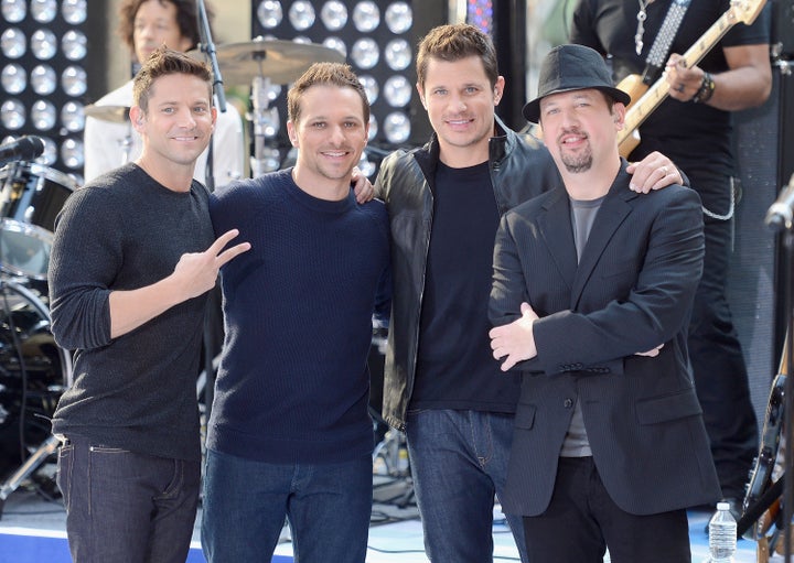 NEW YORK, NY - AUGUST 17: (L-R) Justin Jeffre, Drew Lachey, Nick Lachey and Jeff Timmons of 98 Degrees performs on NBC's 'Today' at Rockefeller Plaza on August 17, 2012 in New York City. (Photo by Jamie McCarthy/Getty Images)