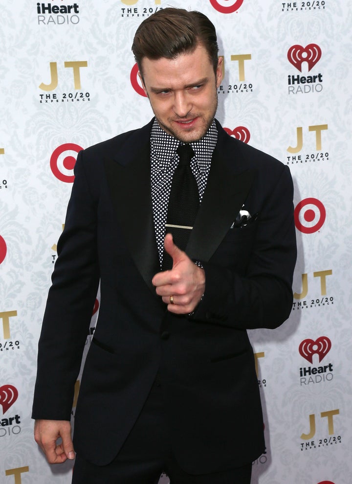 LOS ANGELES, CA - MARCH 18: Recording artist/actor Justin Timberlake poses at the iHeartRadio '20/20' album release party wi