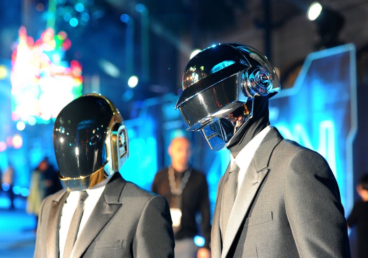 Musicians Thomas Bangalter and Guy-Manuel de Homem-Christo of Daft Punk arrive at Walt Disney's 'TRON: Legacy' World Premiere