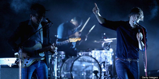 INDIO, CA - APRIL 13: Musicians Laurent Brancowitz and Thomas Mars of Phoenix perform onstage during day 2 of the 2013 Coachella Valley Music & Arts Festival at the Empire Polo Club on April 13, 2013 in Indio, California. (Photo by Christopher Polk/Getty Images for Coachella)