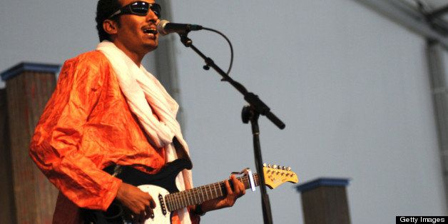 NEW ORLEANS, LA - MAY 05: Bombino (of Niger) performs on stage during New Orleans Jazz & Heritage Festival on May 5, 2012 in New Orleans, United States. (Photo by Leon Morris/Redferns via Getty Images)