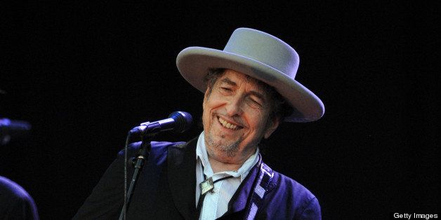 US legend Bob Dylan performs on stage during the 21st edition of the Vieilles Charrues music festival on July 22, 2012 in Carhaix-Plouguer, western France. AFP PHOTO / FRED TANNEAU (Photo credit should read FRED TANNEAU/AFP/GettyImages)